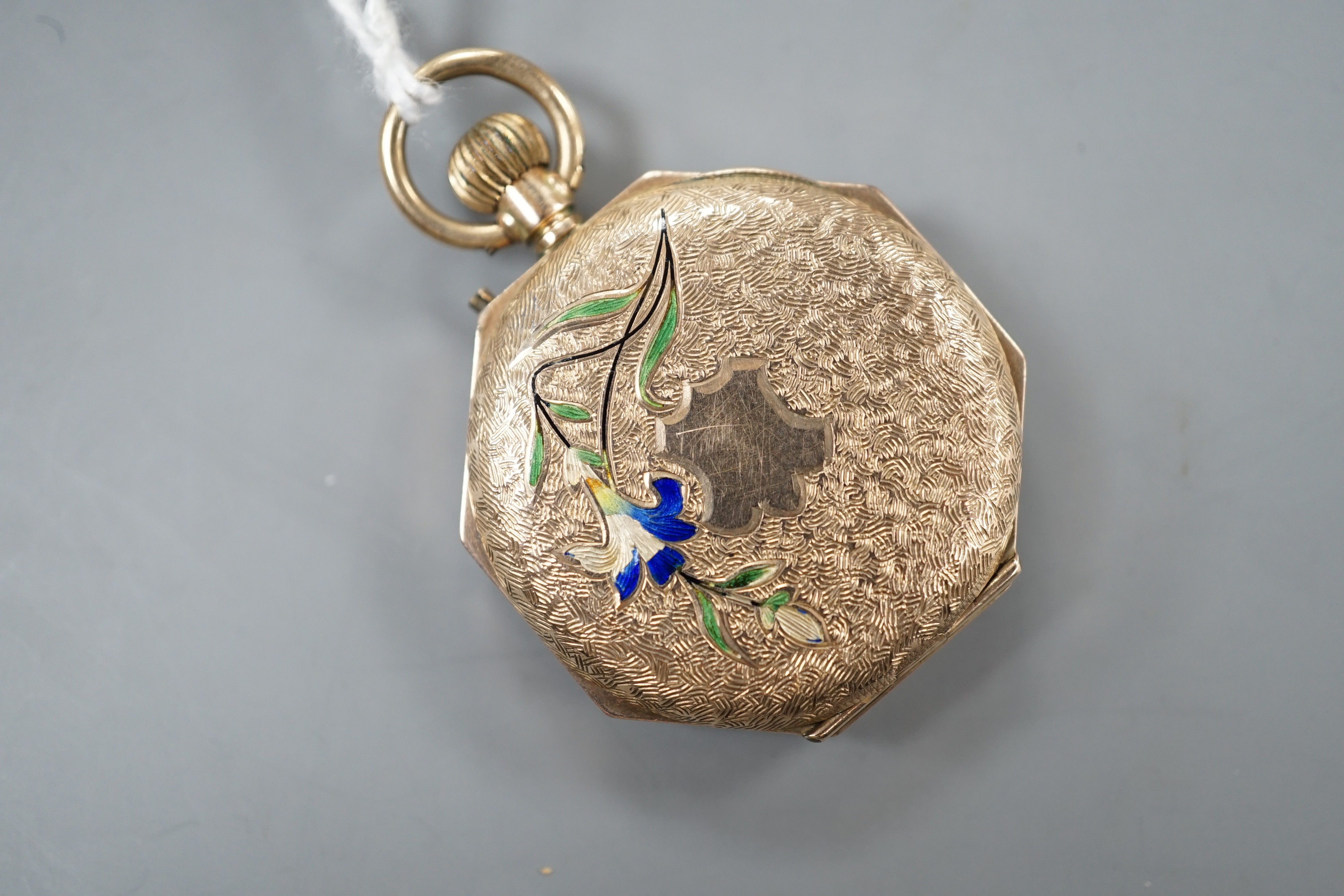 A 1920's 9ct gold and enamel octagonal fob watch, with Roman dial, case diameter 31mm, gross weight 23 grams.